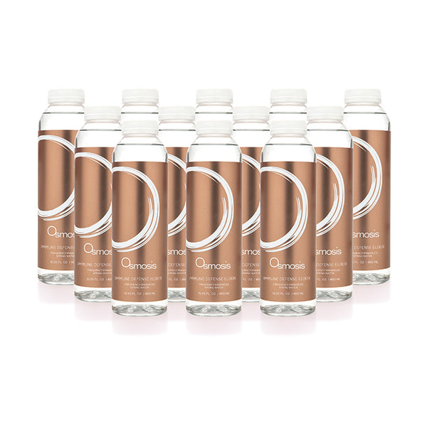 Multiple bottles of Osmosis Immune Defense Elixir on a white background