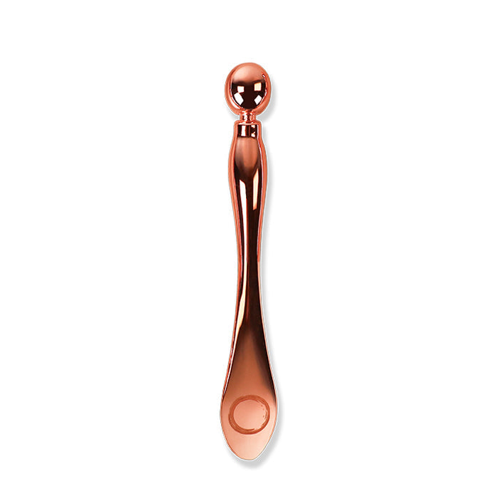 Osmosis mini multi skin tool on white background