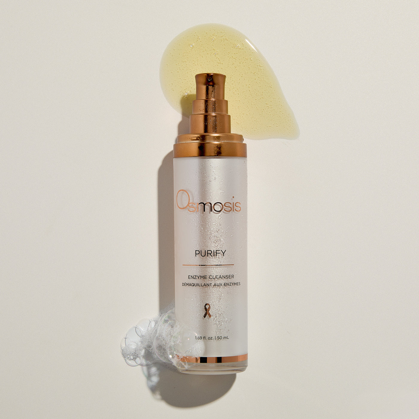 Osmosis Purify skincare product with a pump on a light beige background