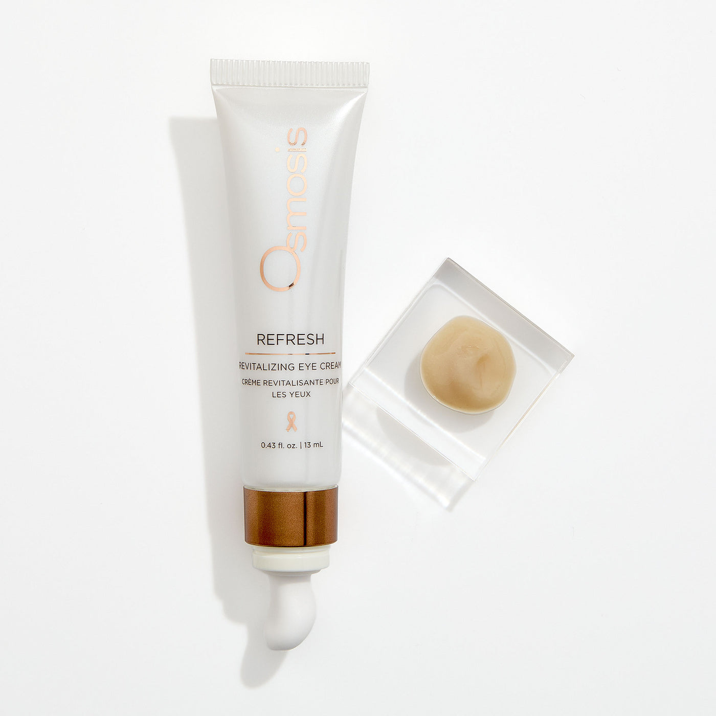 Osmosis Refresh eye creme product with applicator on a white background
