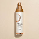 Osmosis peptide activating mist bottle on a beige background