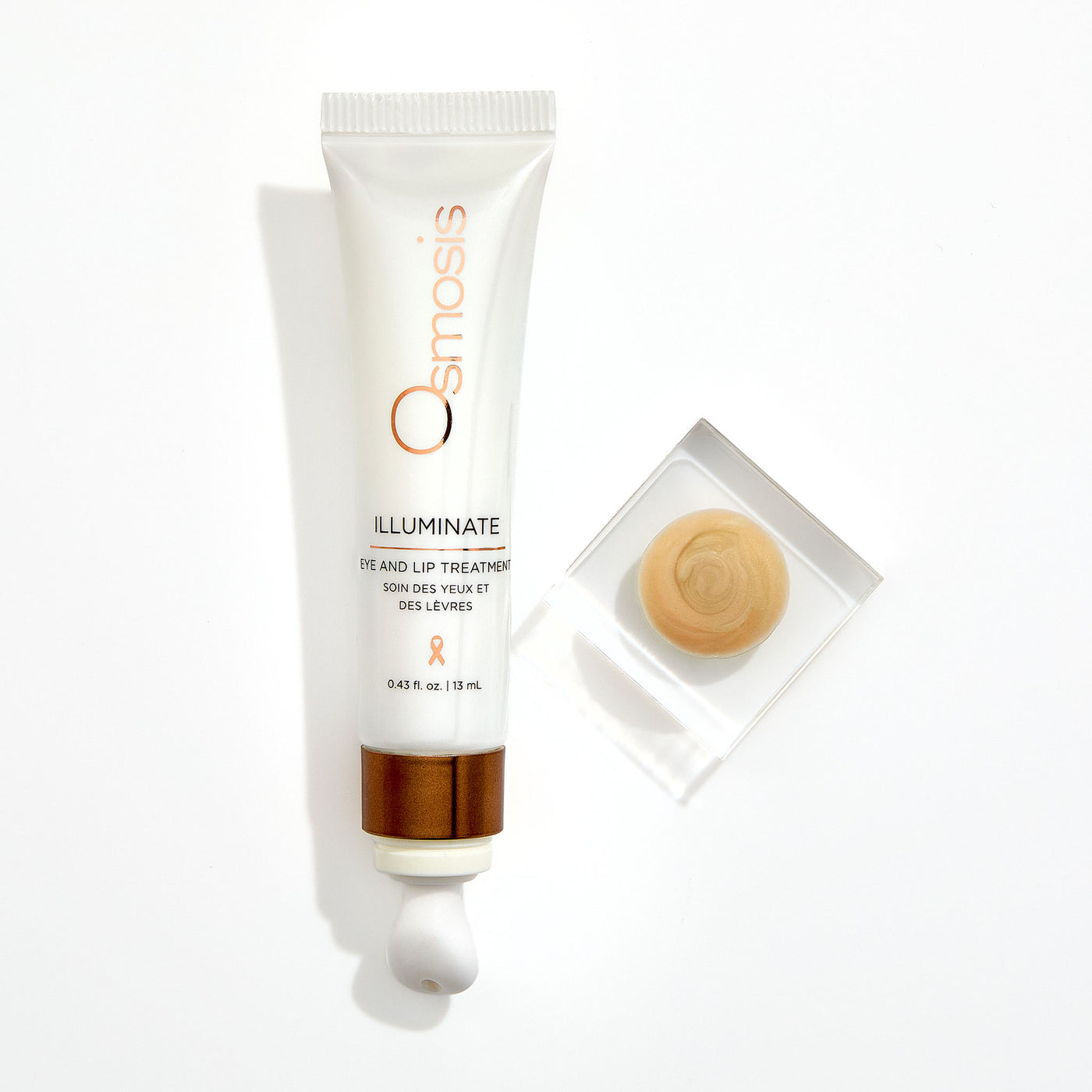 Osmosis Illuminate eye and lip treatment with applicator on a white background with product dollup