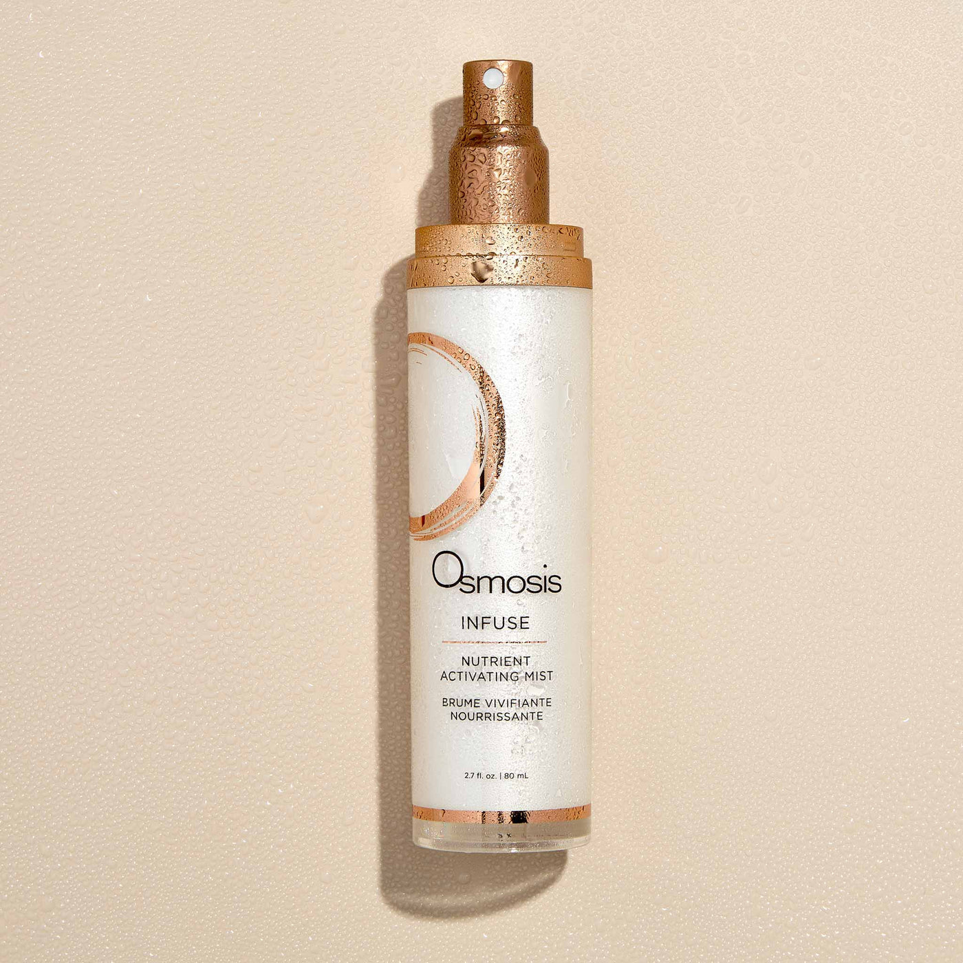 Osmosis Infuse Nutrient Activating Mist skincare product on a beige background