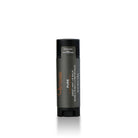 Osmosis black lip balm container on a white background