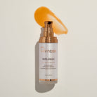 Skincare serum bottle labeled 'Osmosis Replenish' on a beige background with product smear